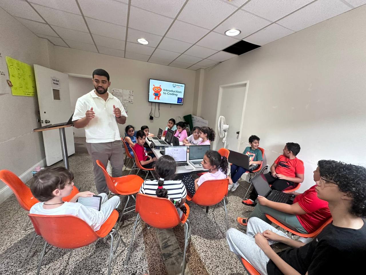 AvendraLabs instructor teaching a coding class cohort in a classroom
